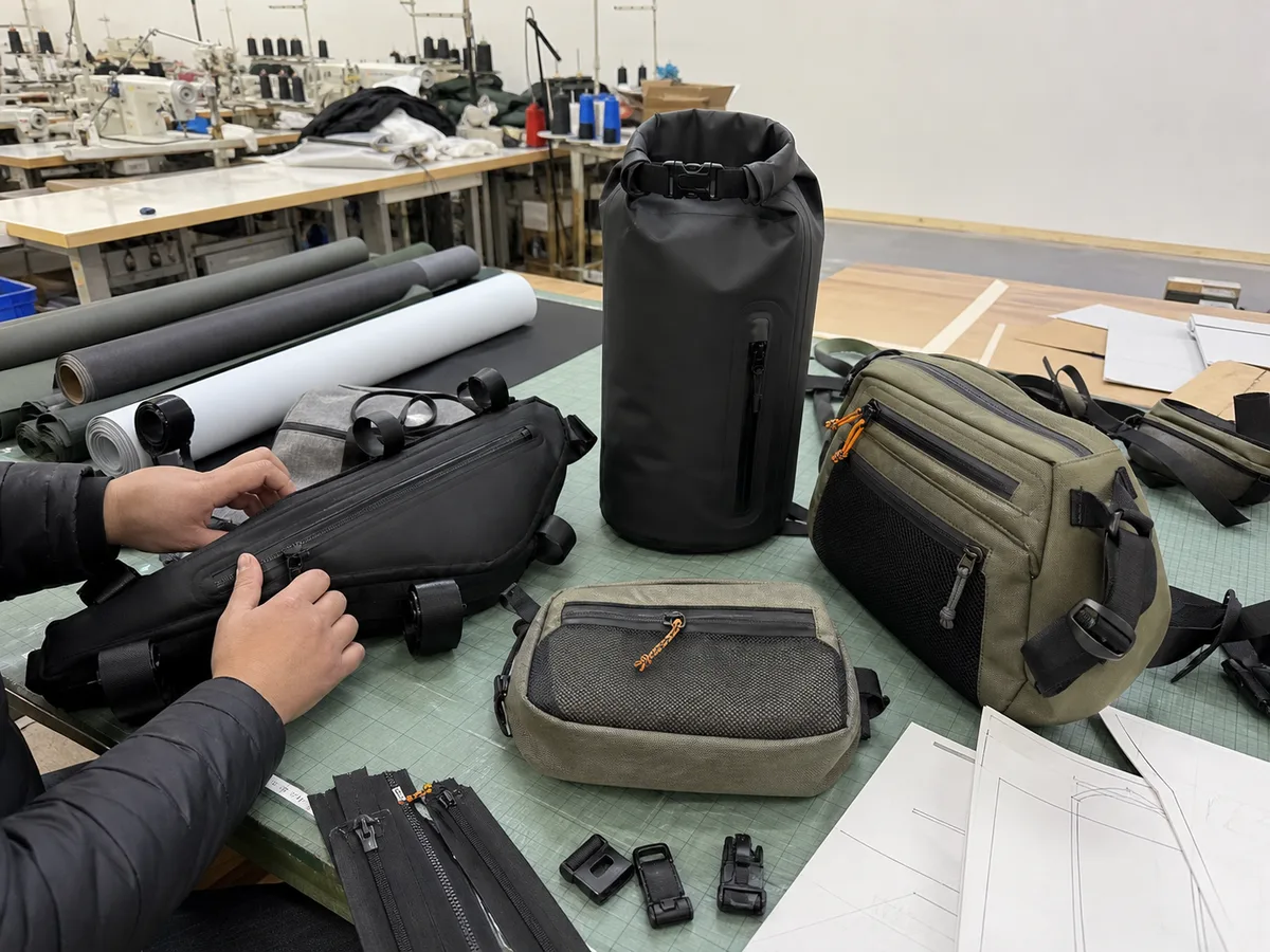 Outdoor gear bag manufacturer factory phone photo