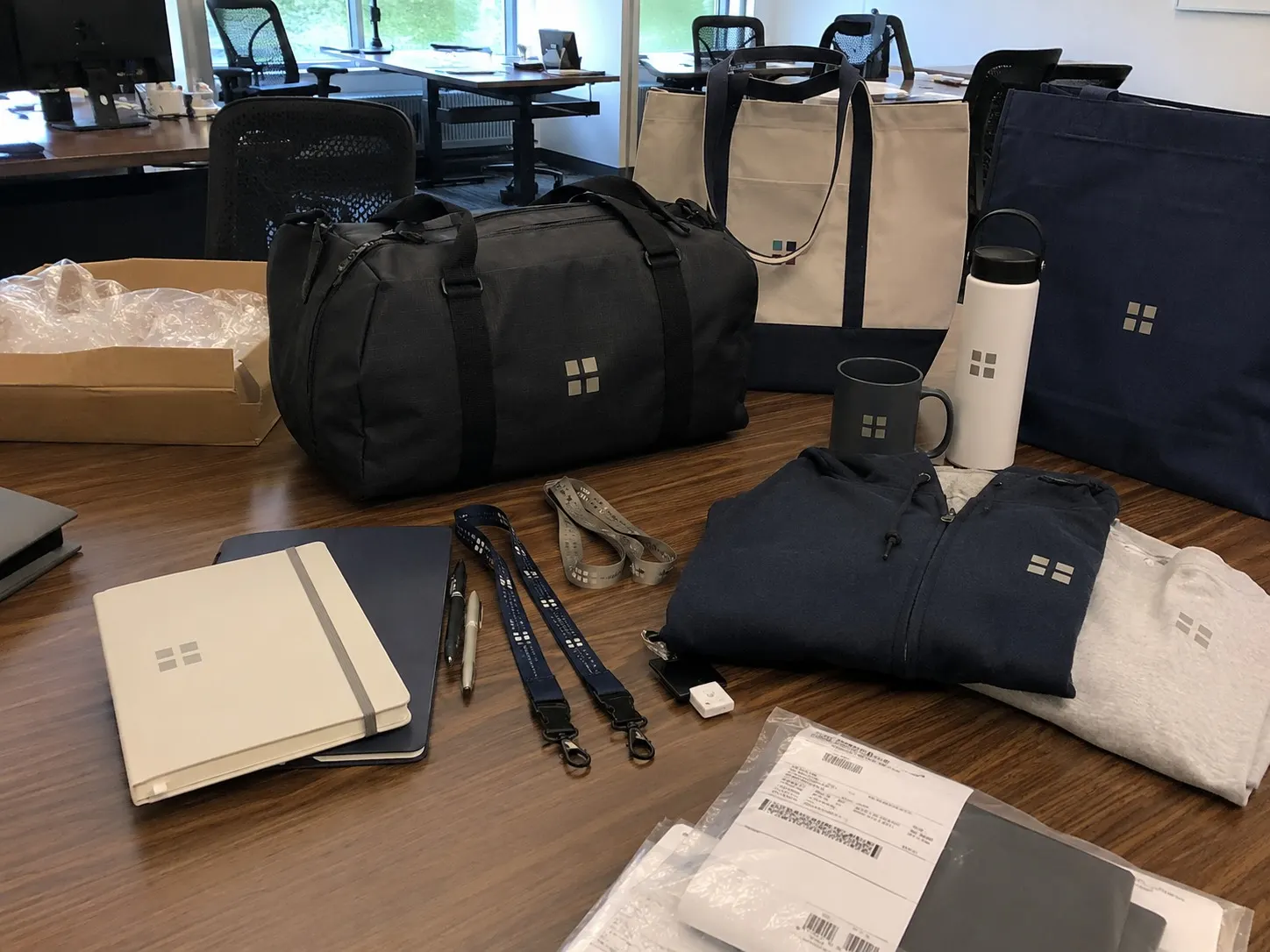 Corporate swag bags and employee gift bags for company culture programs sample program photo